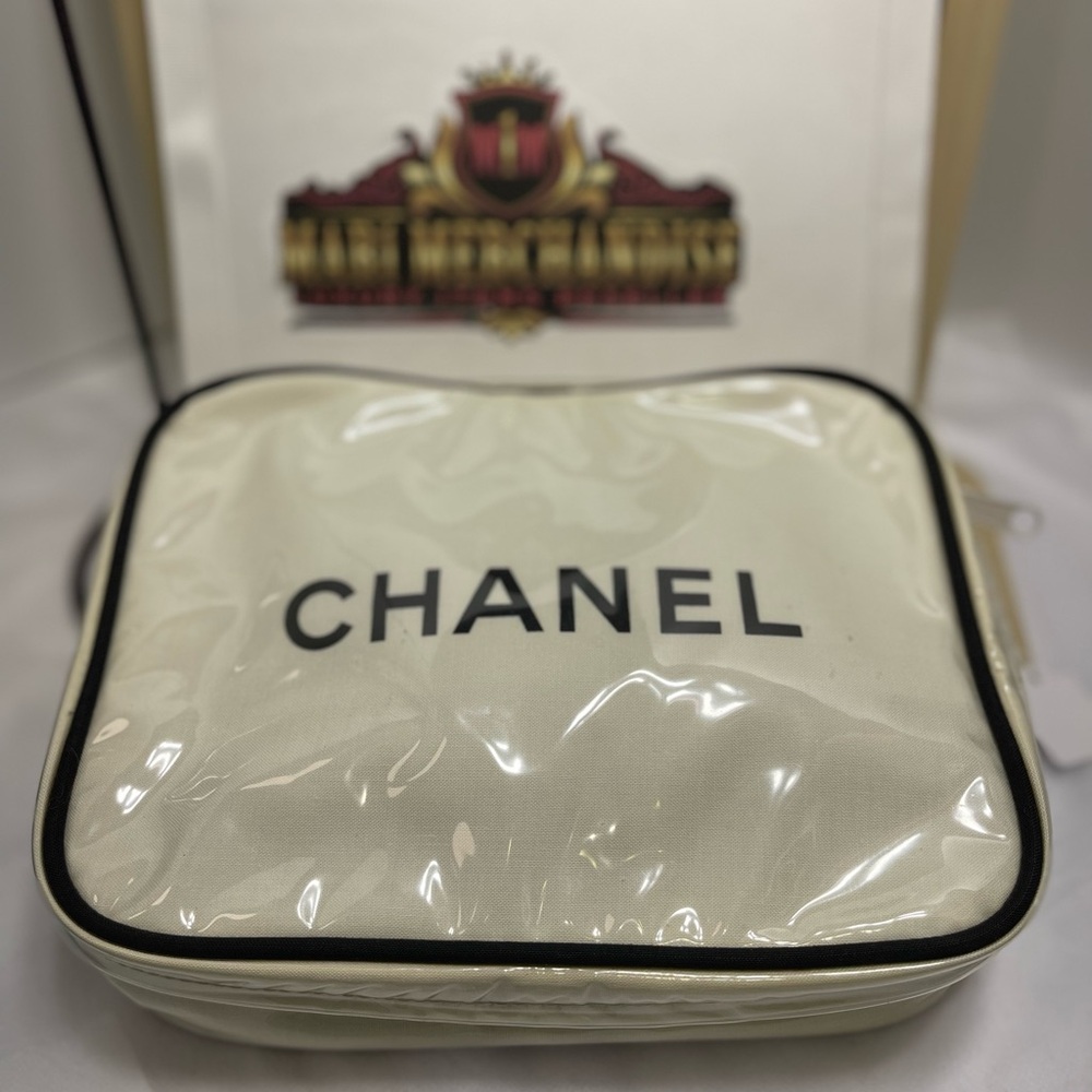 Chanel Beauty Cosmetic Case, in white, lined with black canvas &plastic cover.